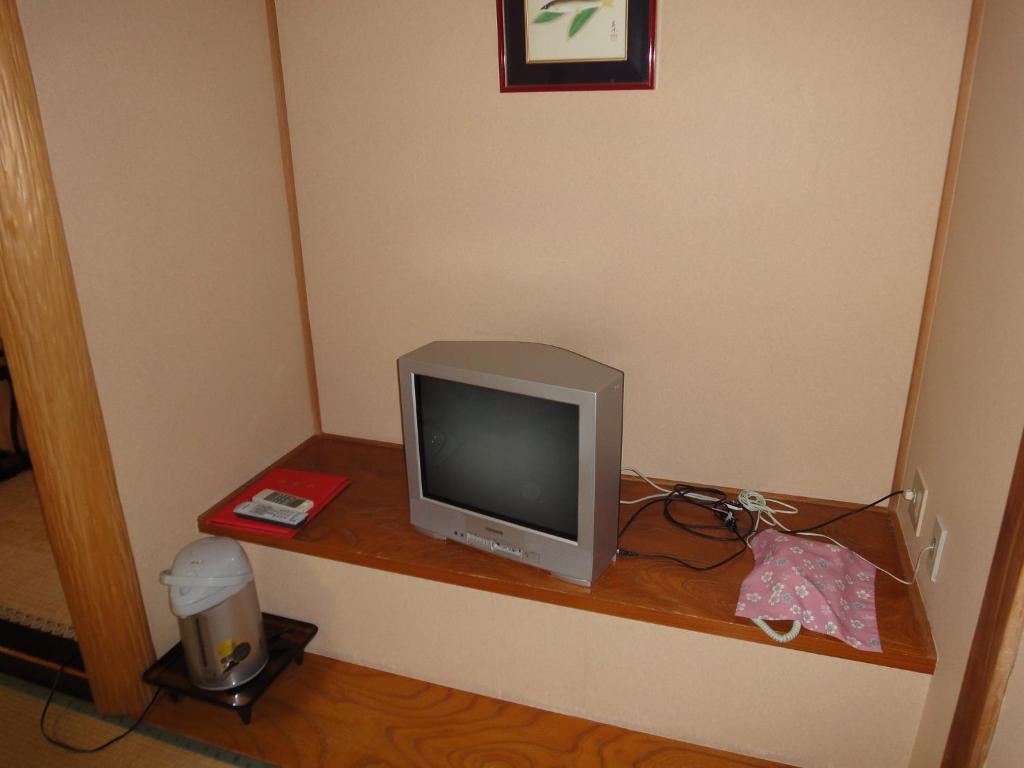 TV a/nebo společenská místnost v ubytování Kanouya