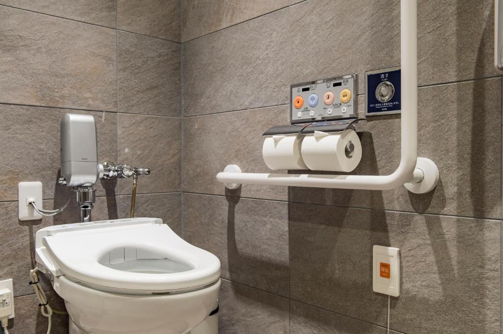 Koupelna v ubytování Hotel Ole