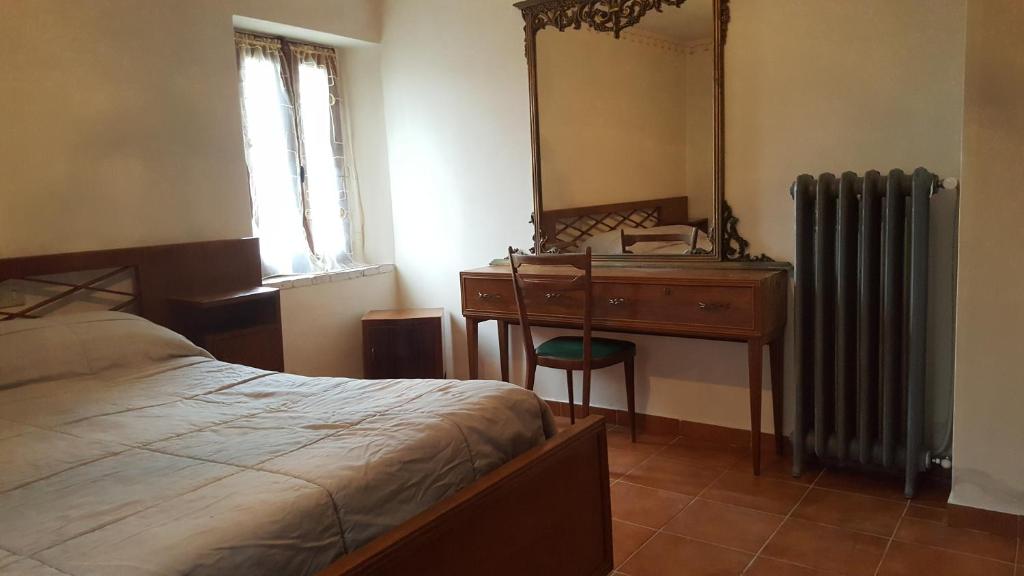 Postel nebo postele na pokoji v ubytování Casa Vecia