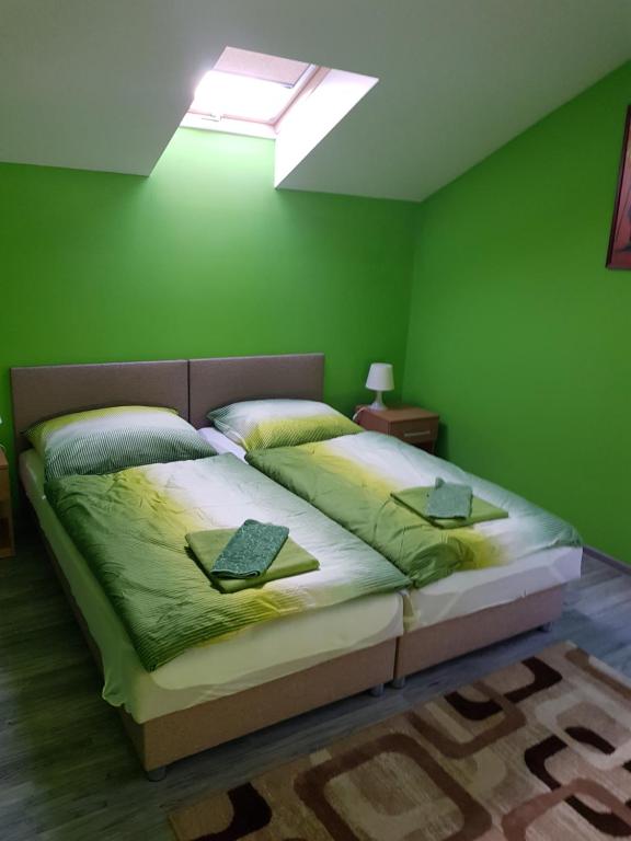 Posteľ alebo postele v izbe v ubytovaní Ubytovanie House