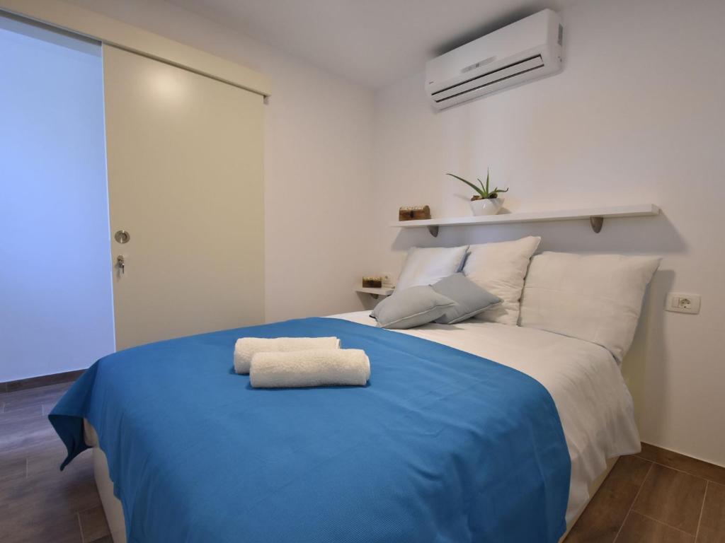 Posteľ alebo postele v izbe v ubytovaní apartment, 3 km outside the historical centre