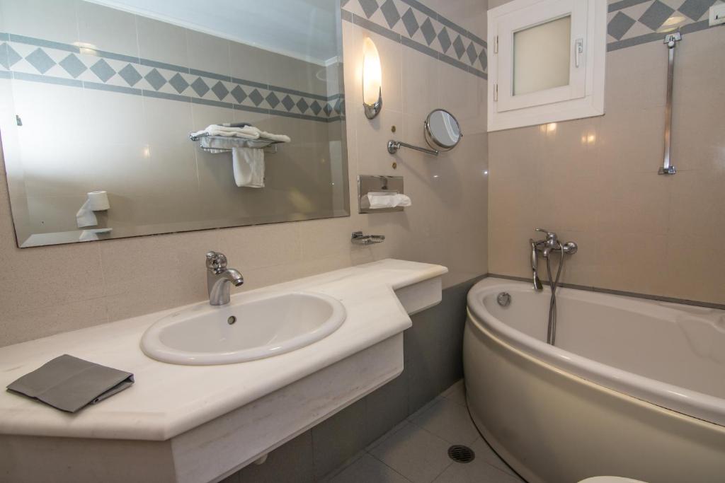 Koupelna v ubytování Hotel Hermes