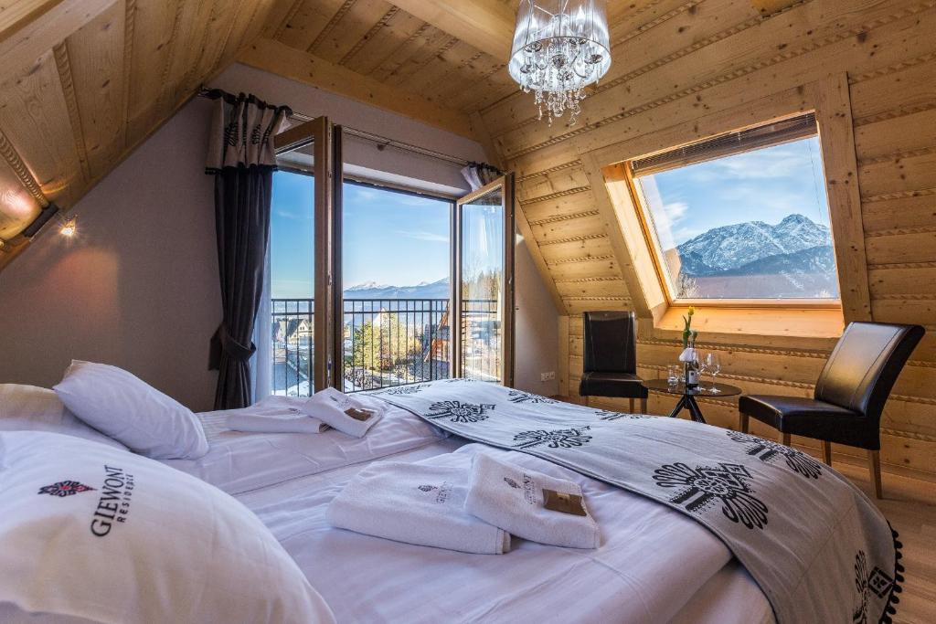 Posteľ alebo postele v izbe v ubytovaní Giewont Residence