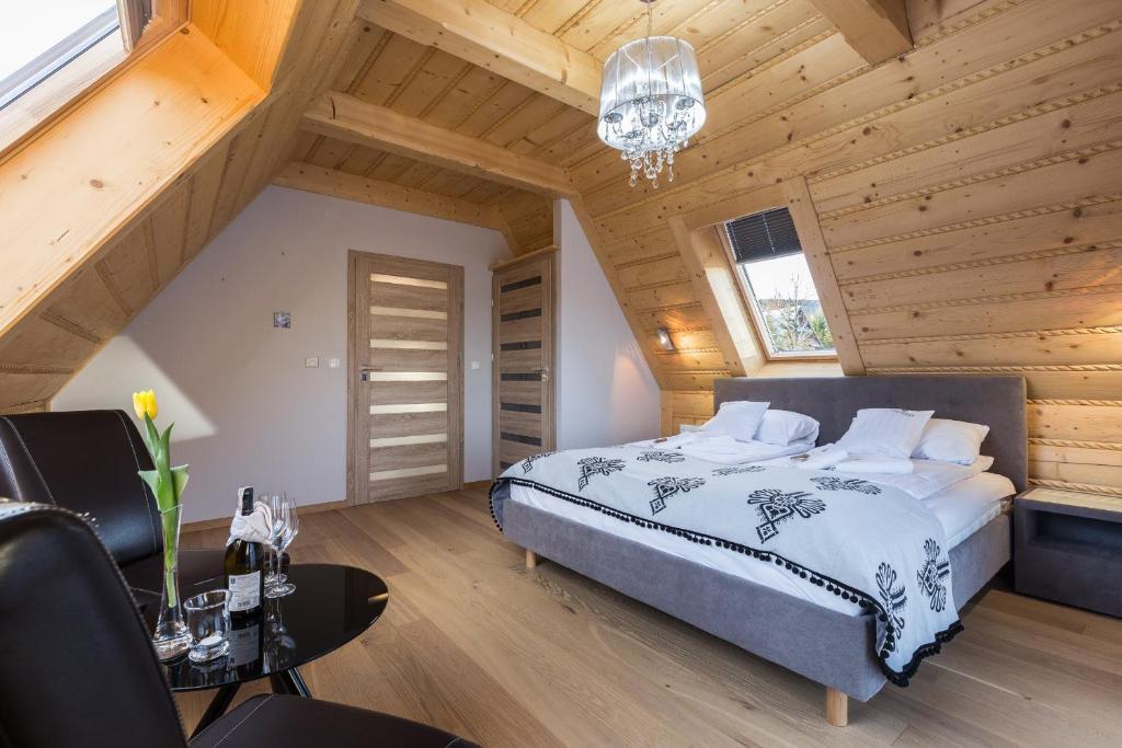 Posteľ alebo postele v izbe v ubytovaní Giewont Residence