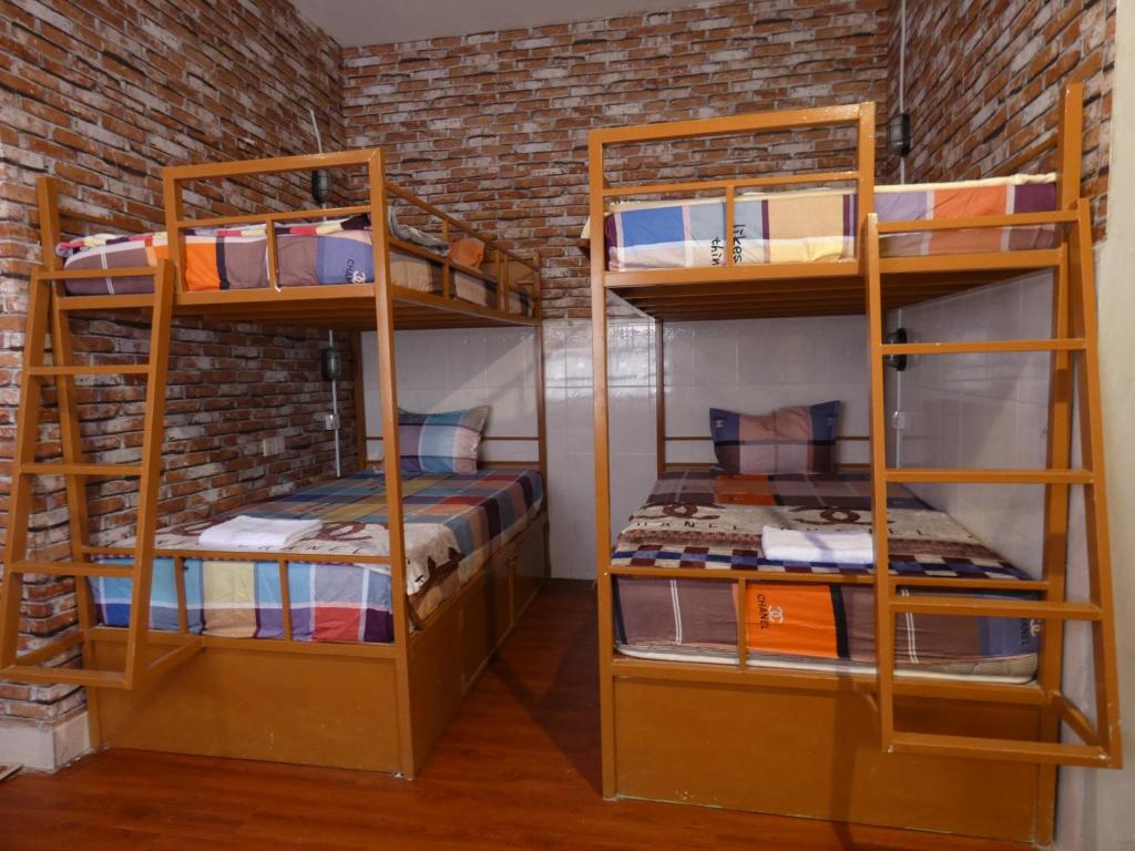 Palanda nebo palandy na pokoji v ubytování Pich Guesthouse