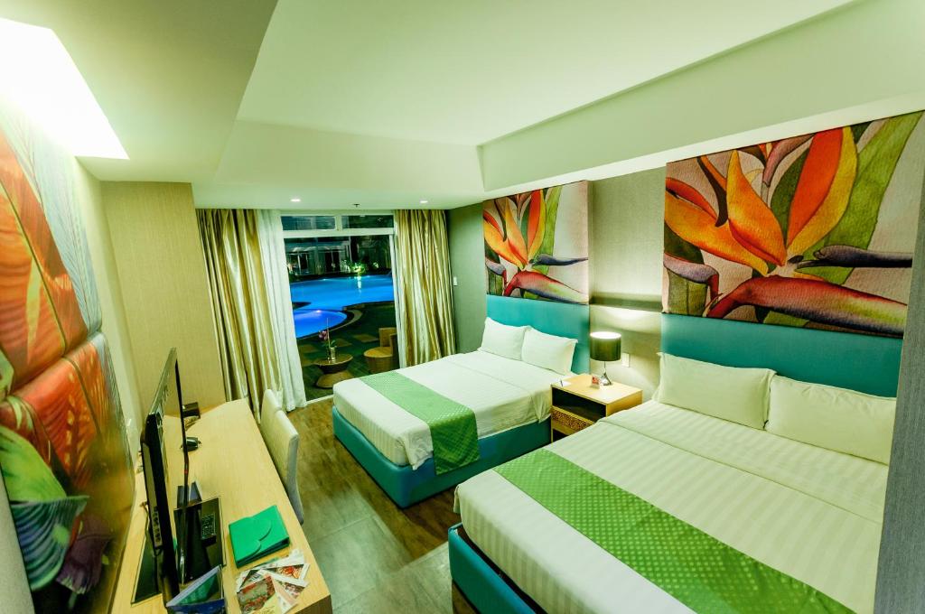 Postel nebo postele na pokoji v ubytování Aziza Paradise Hotel