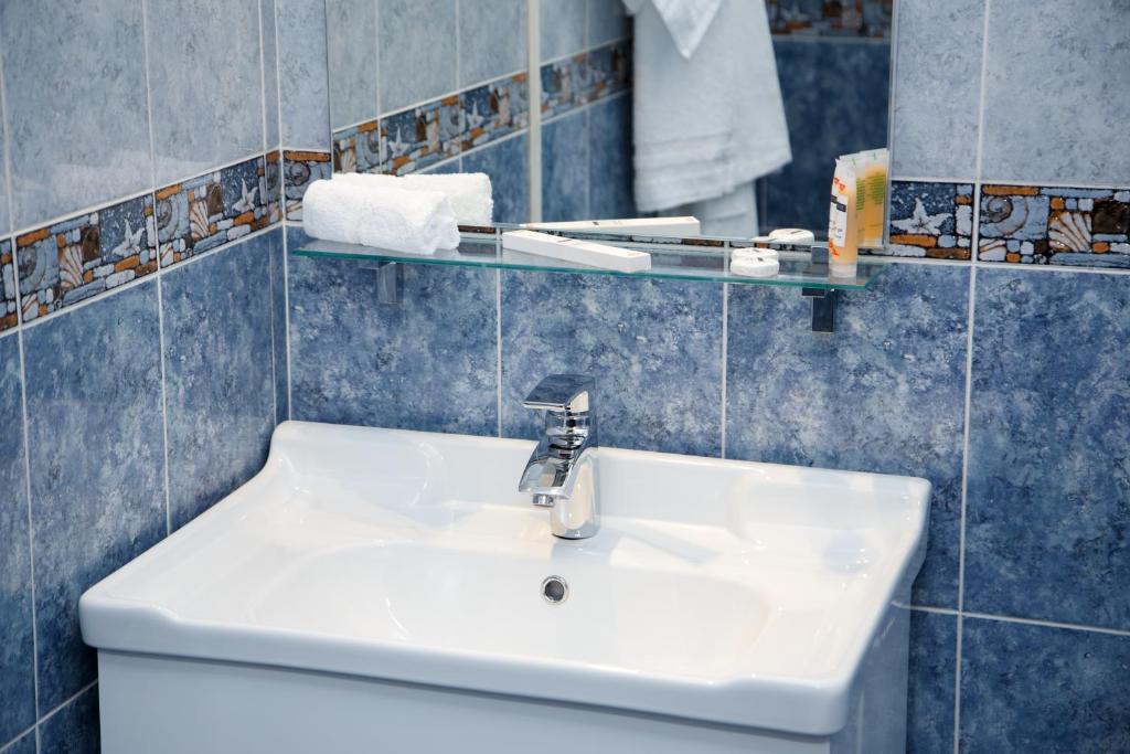 Koupelna v ubytování Lumarc Hotel