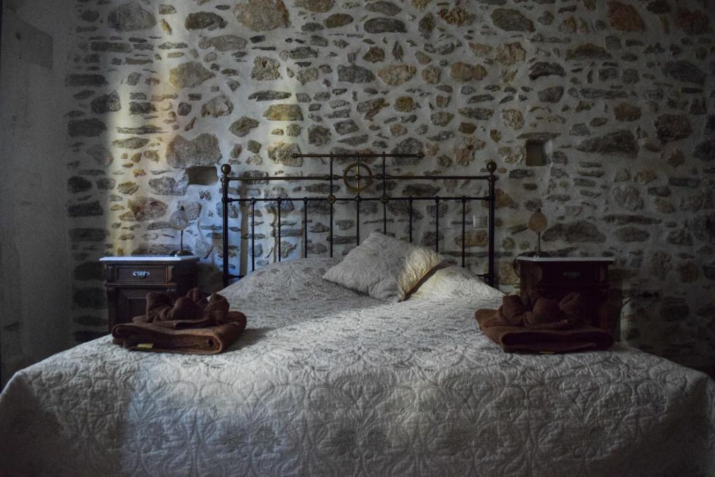 Łóżko lub łóżka w pokoju w obiekcie Villa Aposperitis