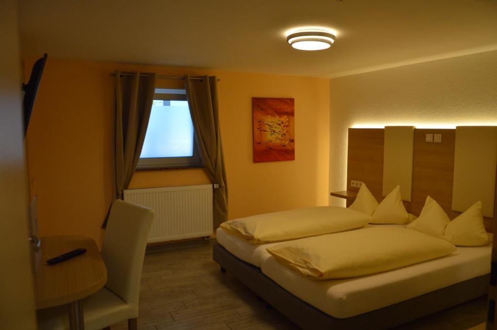 Postel nebo postele na pokoji v ubytování Hotel Mezzero
