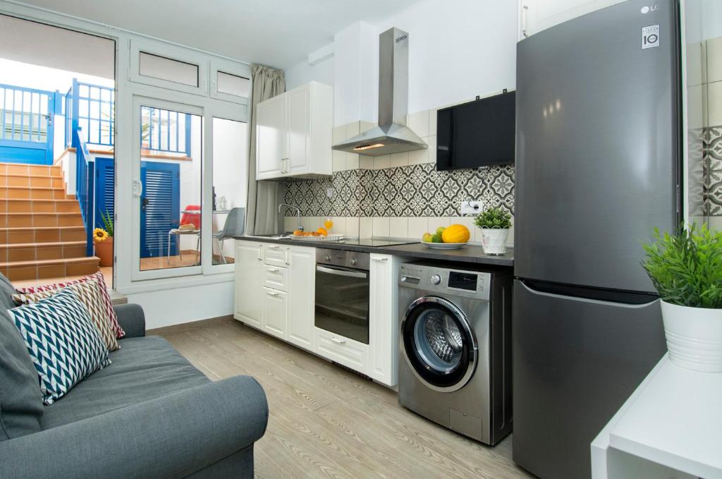 A kitchen or kitchenette at FAMARA. MAREA