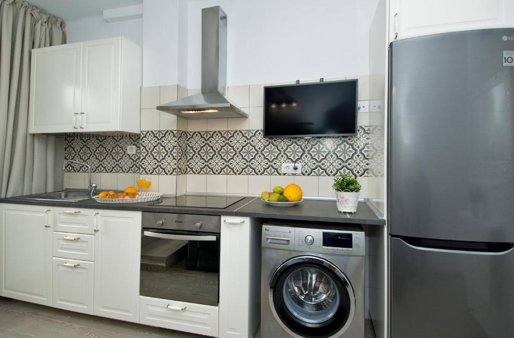 A kitchen or kitchenette at FAMARA. MAREA