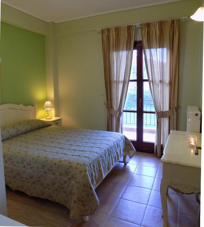 Posteľ alebo postele v izbe v ubytovaní Zaggou Apartments