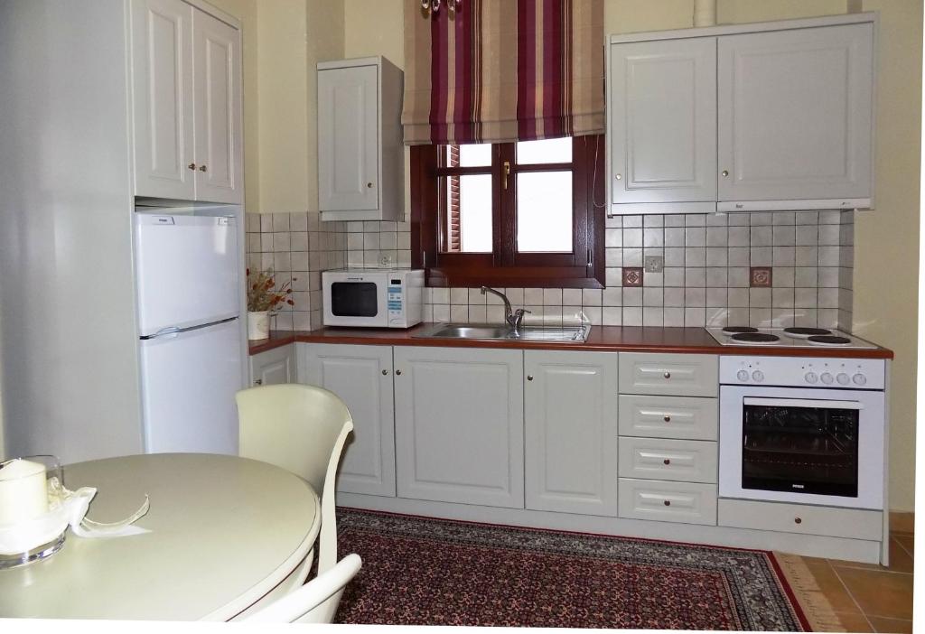 Kuchyňa alebo kuchynka v ubytovaní Zaggou Apartments
