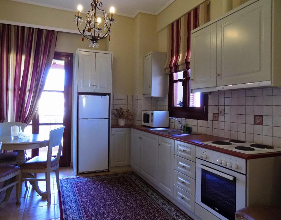Kuchyňa alebo kuchynka v ubytovaní Zaggou Apartments