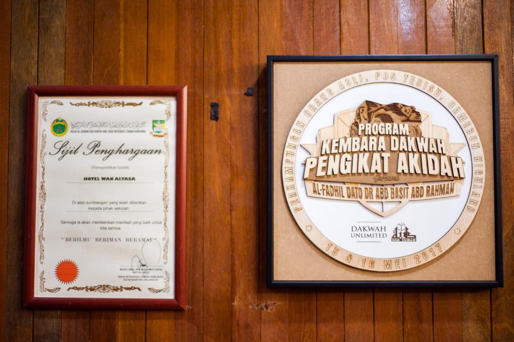 Certifikát, hodnocení, plakát nebo jiný dokument vystavený v ubytování Wan Alyasa Hotel