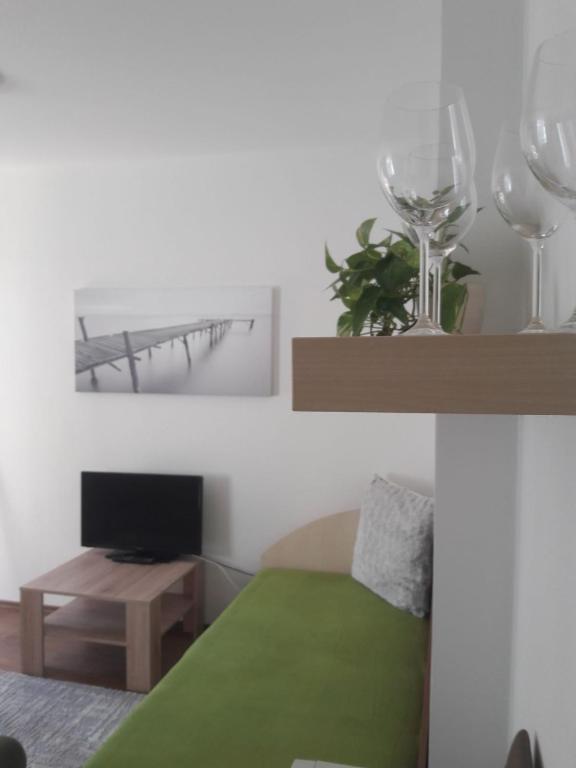 TV a/nebo společenská místnost v ubytování Apartmány Lípa