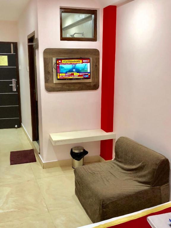 TV a/nebo společenská místnost v ubytování Hotel Landmark