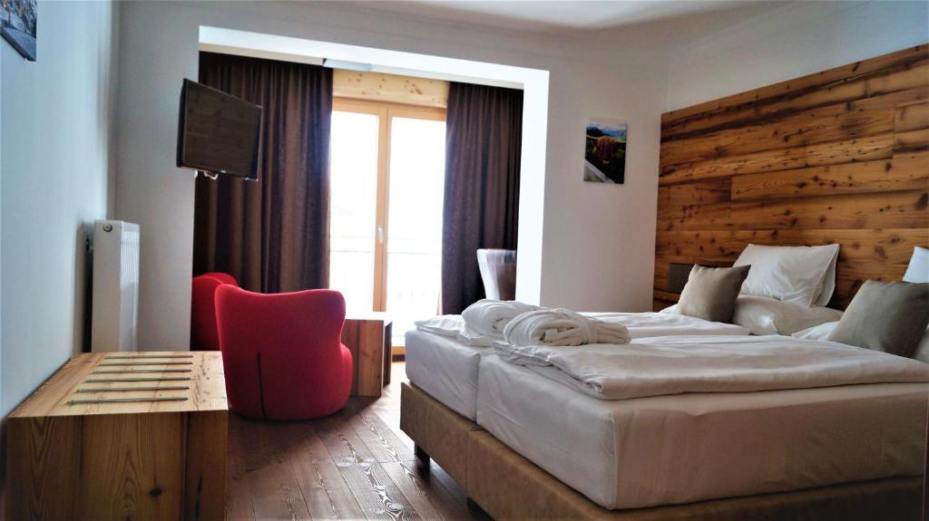 Postel nebo postele na pokoji v ubytování Hotel Binggl