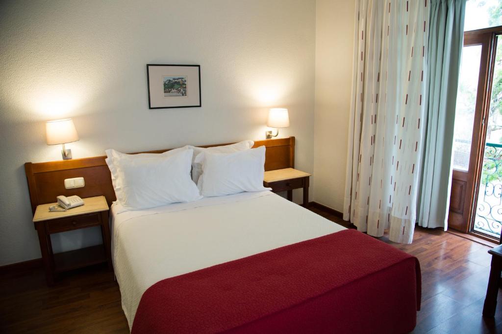 Postel nebo postele na pokoji v ubytování Hotel Solaris