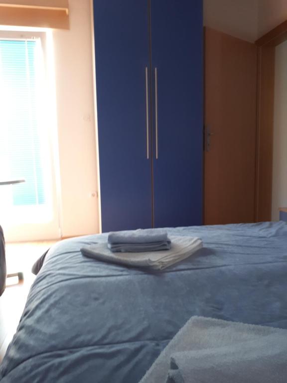 Postel nebo postele na pokoji v ubytování Apartments Bambi