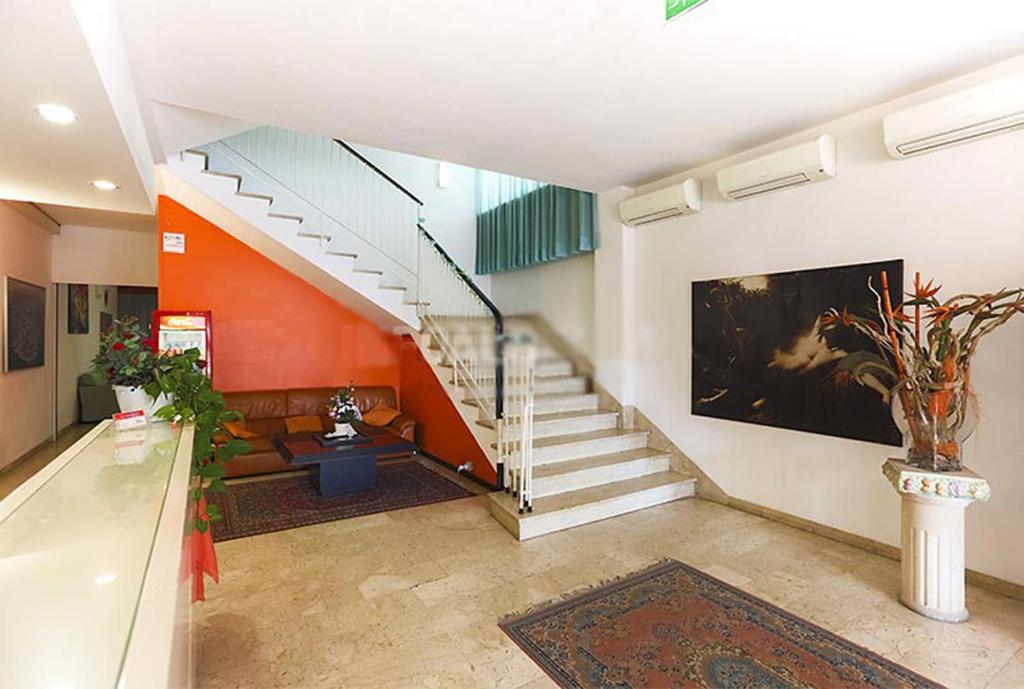 TV a/nebo společenská místnost v ubytování Hotel Galles Rimini