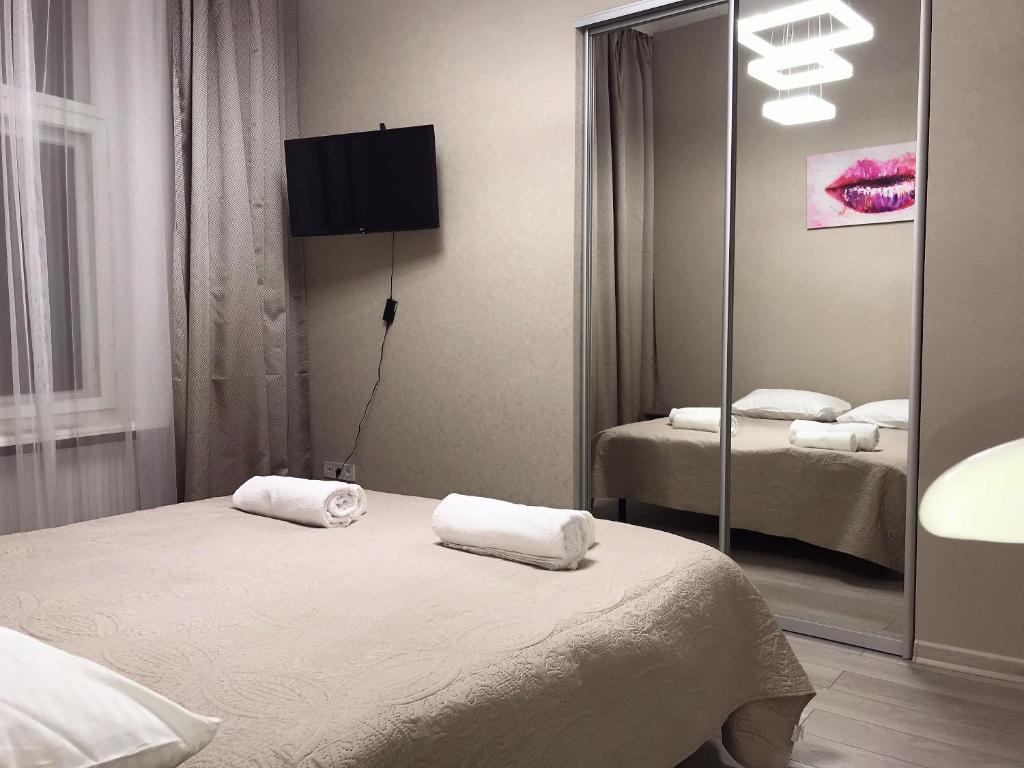 Ein Bett oder Betten in einem Zimmer der Unterkunft Затишна квартира в центрі Львова