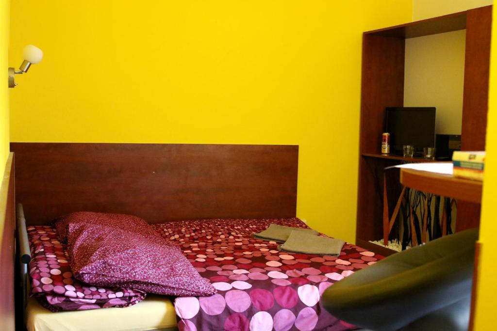 Postel nebo postele na pokoji v ubytování Penzion Vulture Havířov