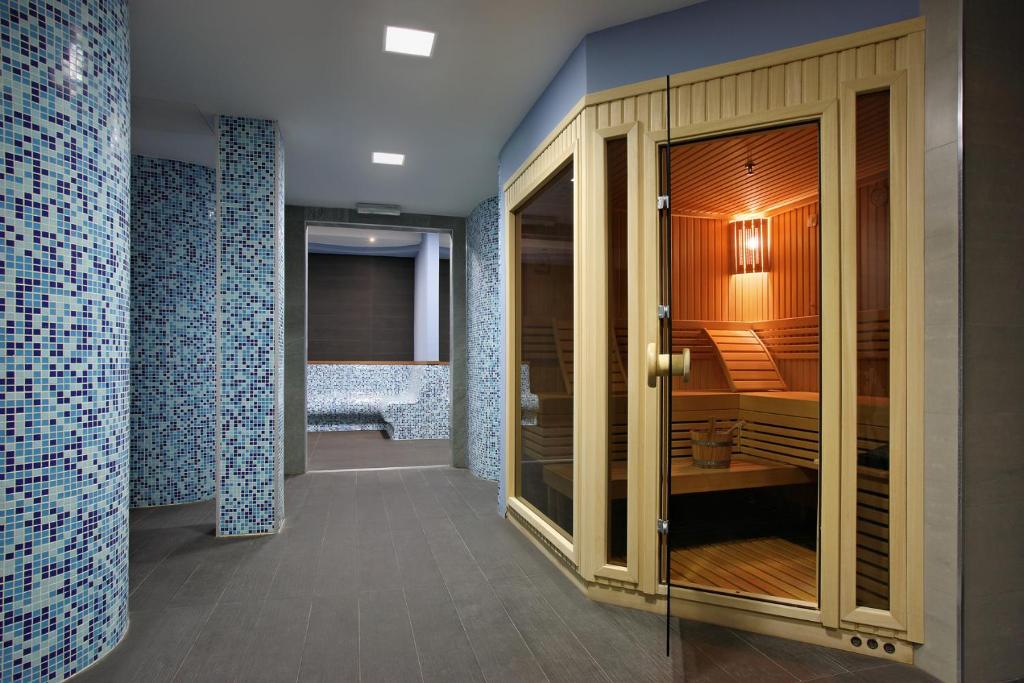 Postel nebo postele na pokoji v ubytování Hotel Srbija Lux