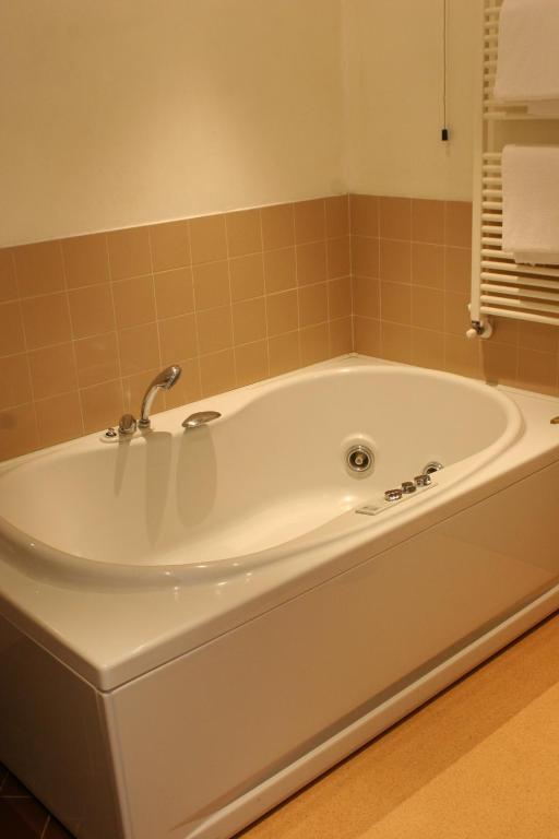 Koupelna v ubytování Orzihotel