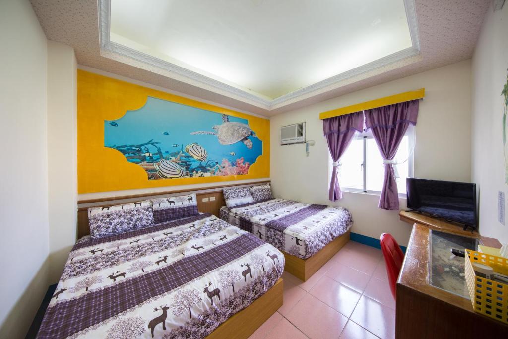 Postel nebo postele na pokoji v ubytování Blue Sea Romance B&B