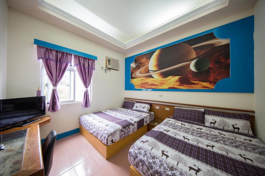Postel nebo postele na pokoji v ubytování Blue Sea Romance B&B