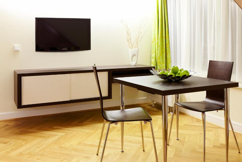 TV a/nebo společenská místnost v ubytování Hapimag Ferienwohnungen Dresden