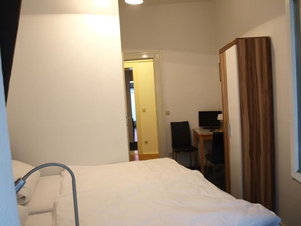 Postel nebo postele na pokoji v ubytování Hotel-Pension Dorma
