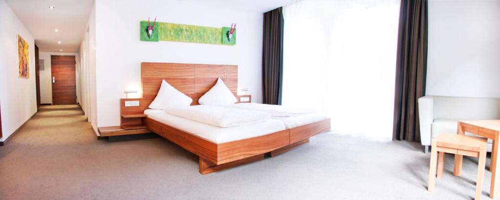 Postel nebo postele na pokoji v ubytování Pepis Skihotel