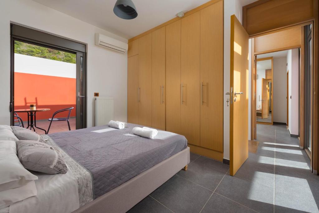 A bed or beds in a room at Almond Villa