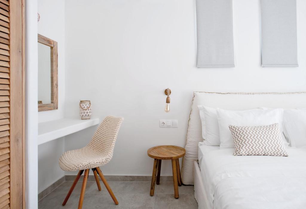 Postel nebo postele na pokoji v ubytování Elements Villas