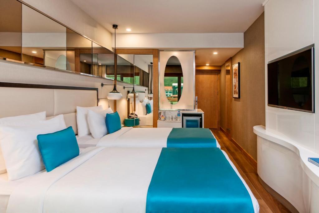 Postel nebo postele na pokoji v ubytování Elite World Marmaris - Adult Only