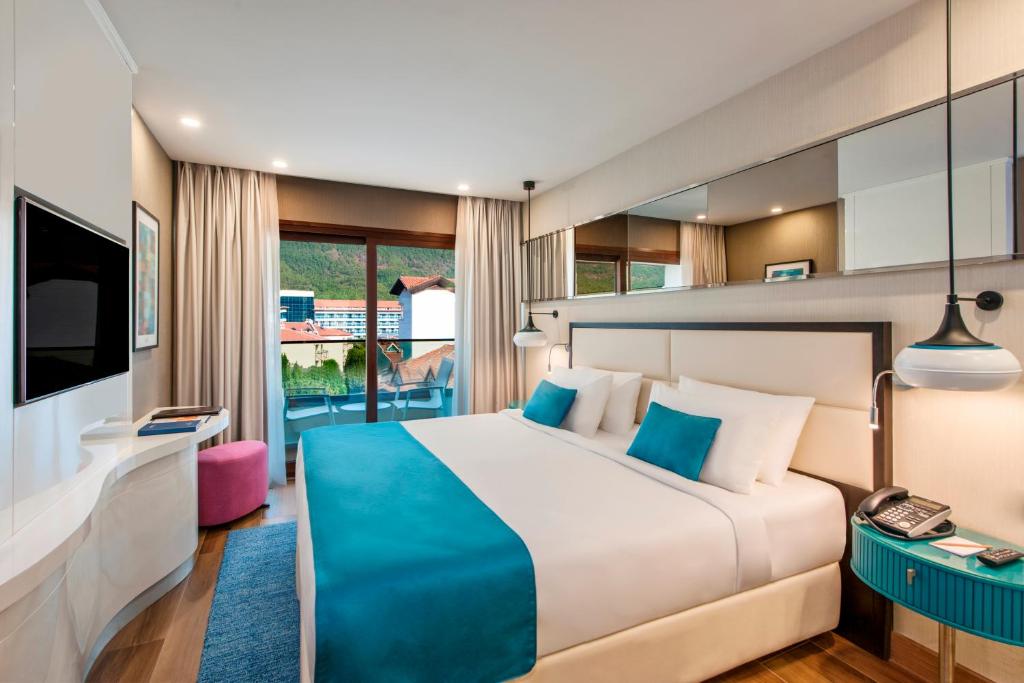 Postel nebo postele na pokoji v ubytování Elite World Marmaris - Adult Only