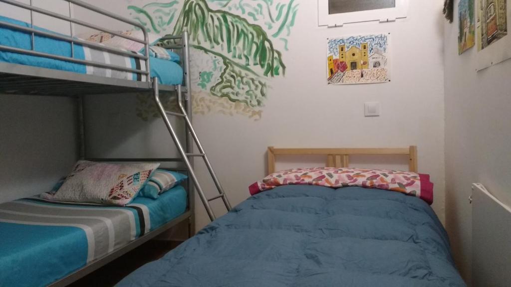 Letto o letti in una camera di Casa Isabel
