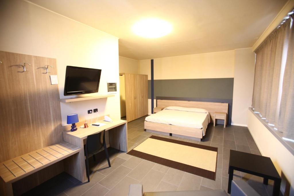 Postel nebo postele na pokoji v ubytování Valtidone Hotel