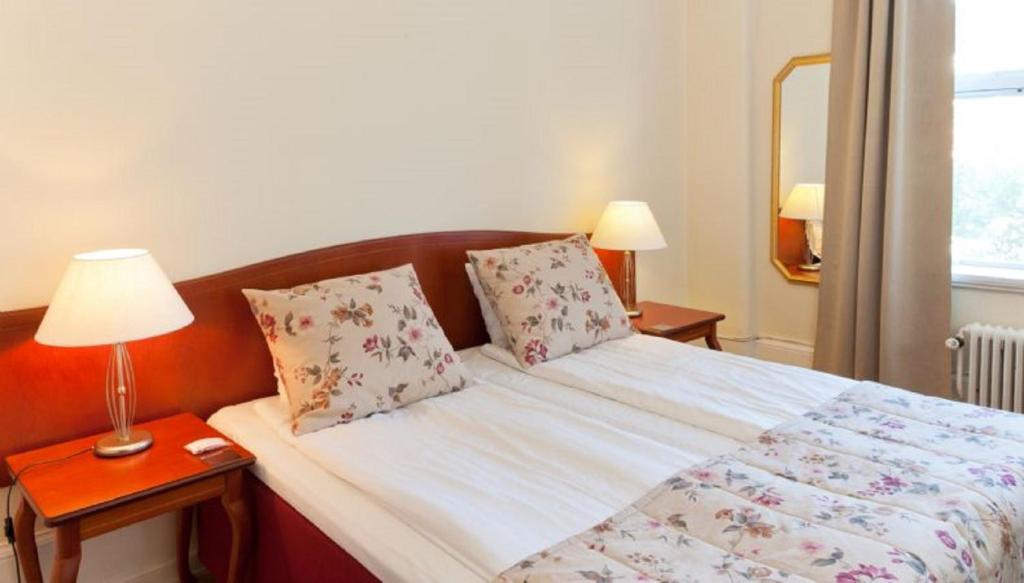 Postel nebo postele na pokoji v ubytování Frimurarehotellet; Sure Hotel Collection by Best Western