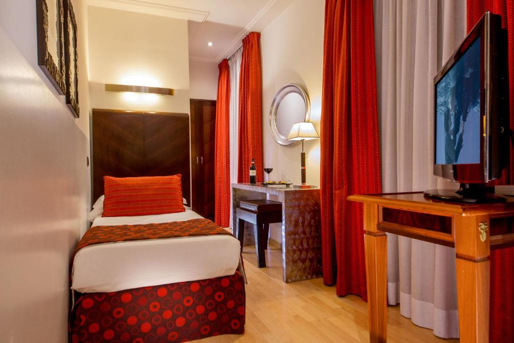 TV a/nebo společenská místnost v ubytování Hotel Ariston