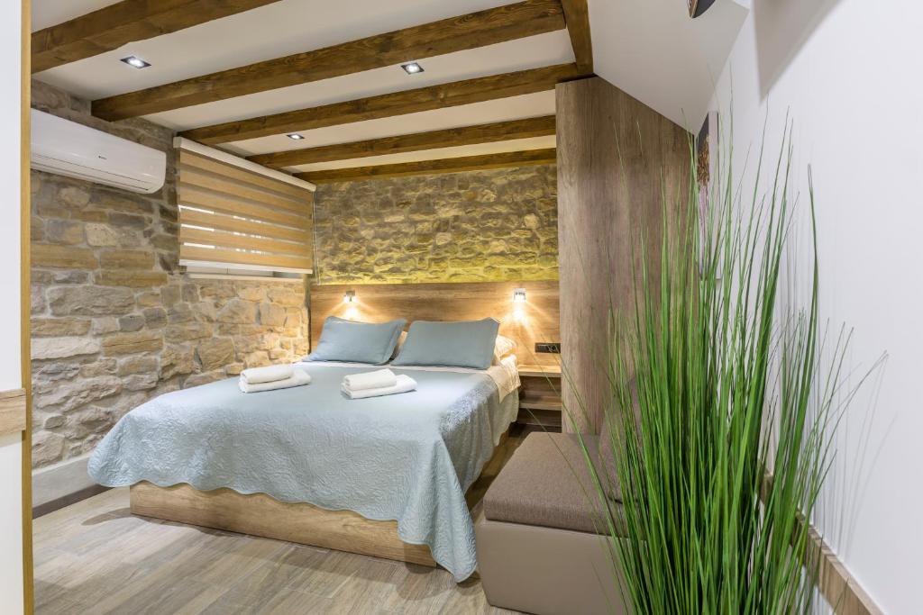Posteľ alebo postele v izbe v ubytovaní Reval Luxury Stone house apartments****
