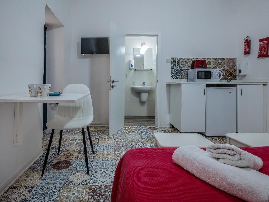Kuchyň nebo kuchyňský kout v ubytování Valletta Ajkla Mansion