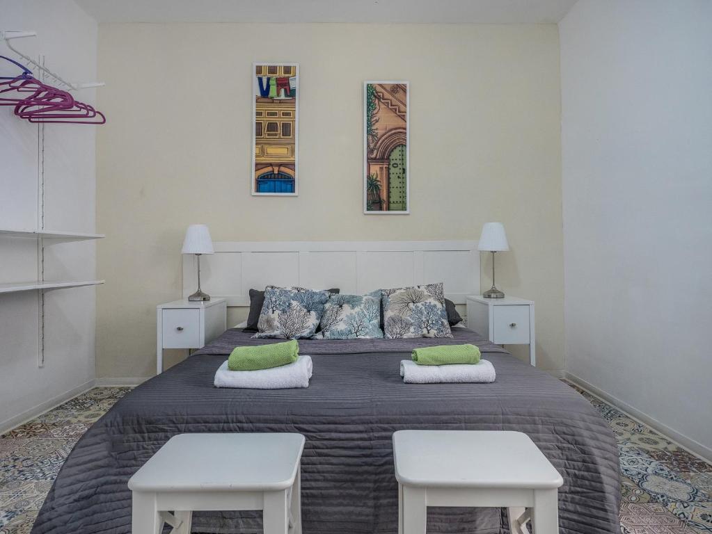 Postel nebo postele na pokoji v ubytování Valletta Ajkla Mansion