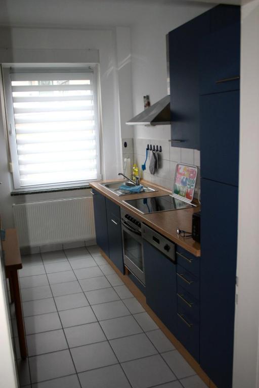 Kuchyň nebo kuchyňský kout v ubytování Atrium City