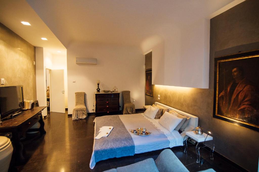 Postel nebo postele na pokoji v ubytování Atmosfere Puniche b&b