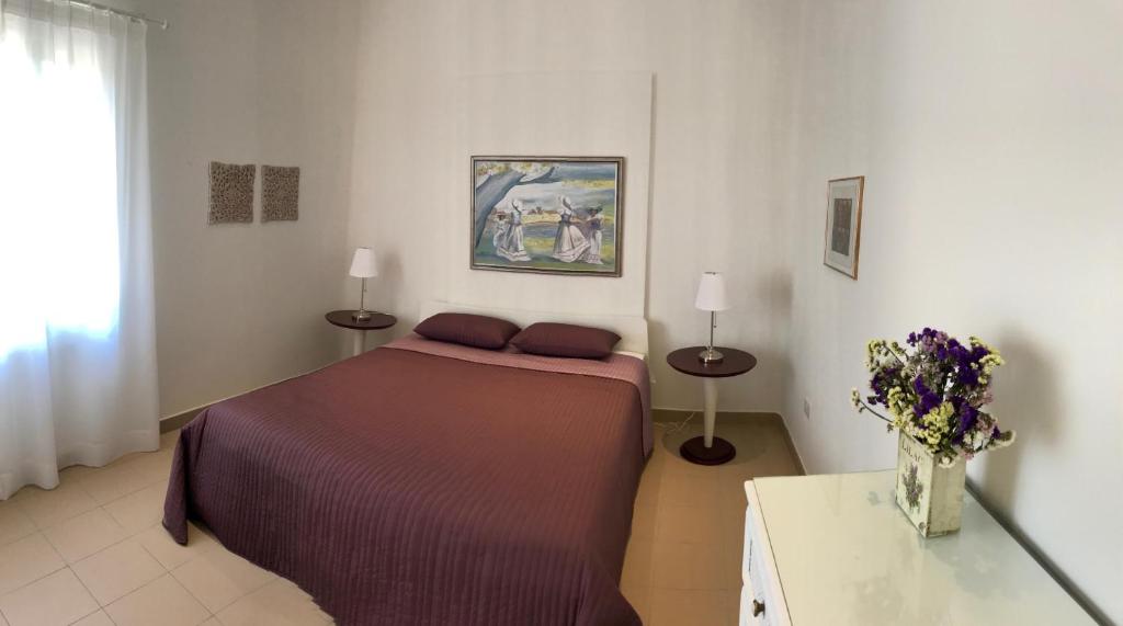 Postel nebo postele na pokoji v ubytování Avgi's Home