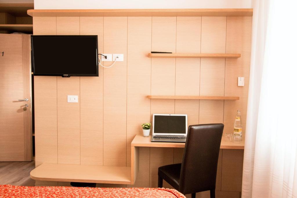 TV a/nebo společenská místnost v ubytování Al Benvenuto Hotel & Restaurant