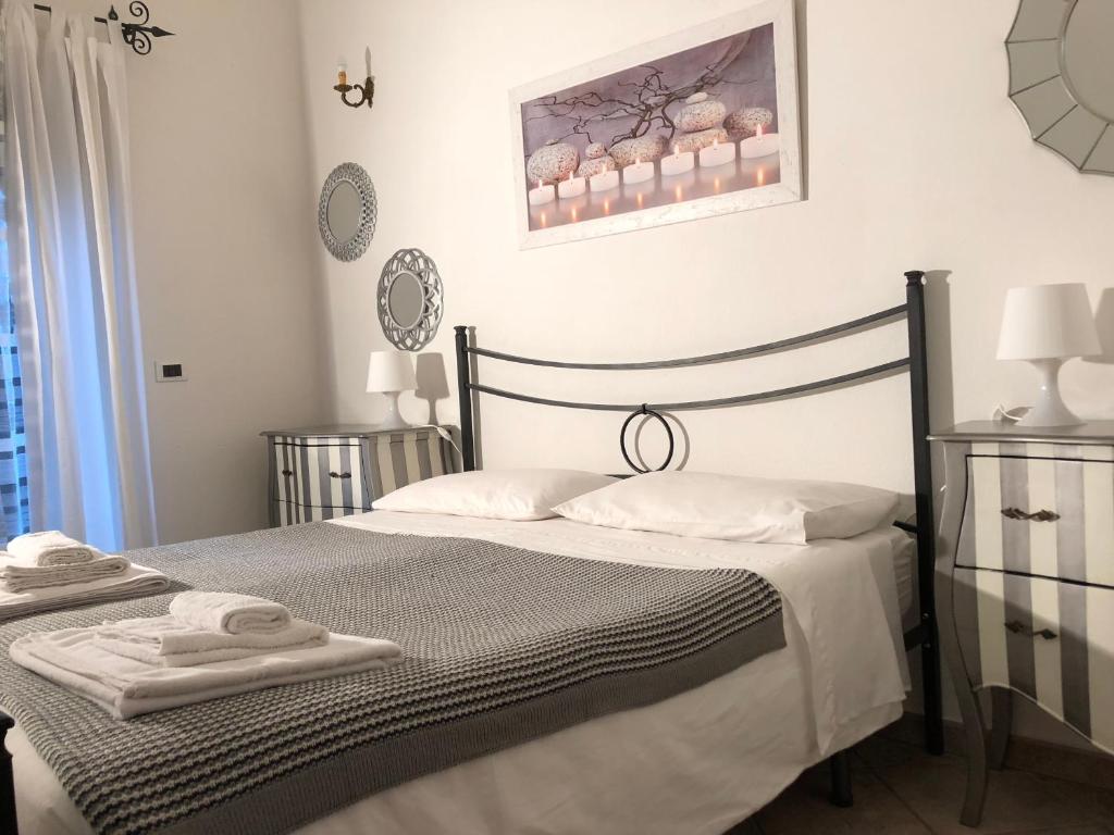 Postel nebo postele na pokoji v ubytování B&B Villa Loriana